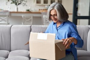 woman packaging consignments